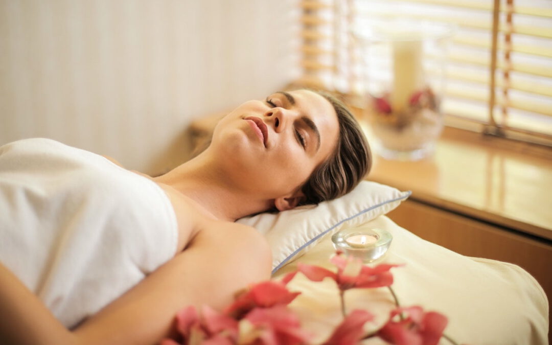 woman in towel laying down