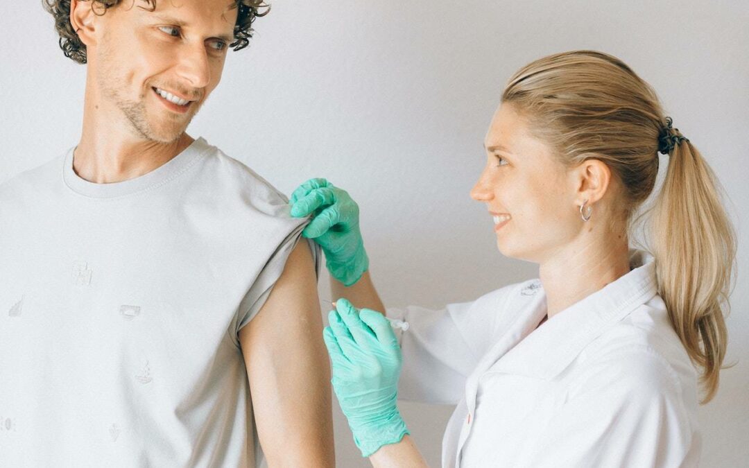 man getting testosterone replacement therapy through injection